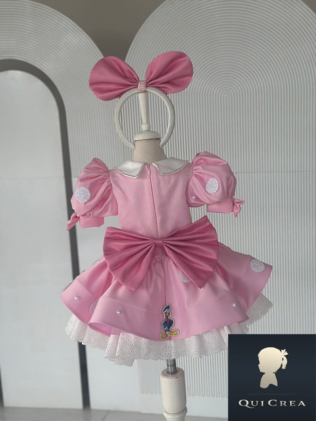 Abito rosa con fiocco Minnie Mouse - Vista posteriore