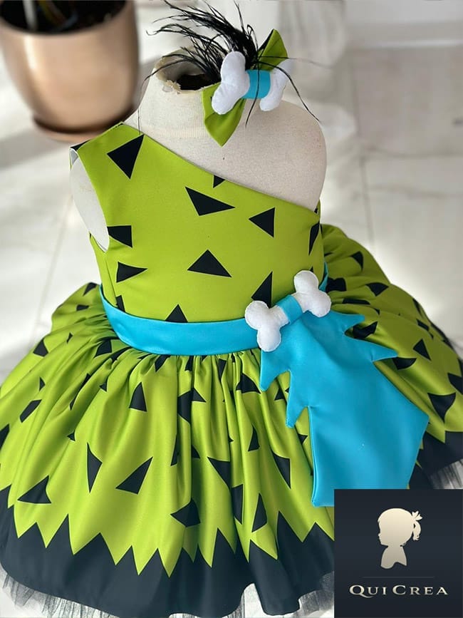 Vestito Flintstones Bambina - Abito Elegante con Accessori a Tema 4 Tessuto verde con stampa preistorica nera dell'abito Flintstones